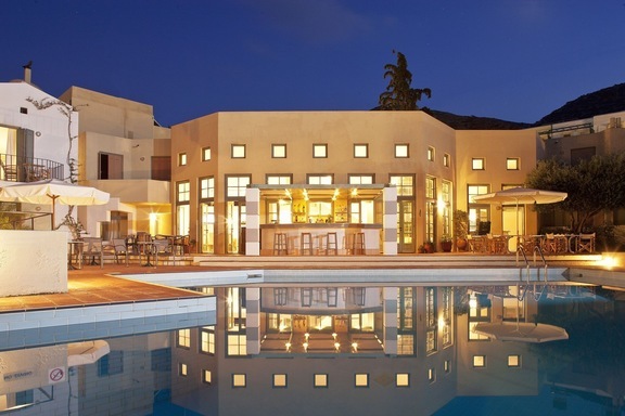 Evening ambiance around the pool of Galaxy Villas, one of the best of Hersonissos Crete hotels, offering serviced apartments and villas with hotel facilities